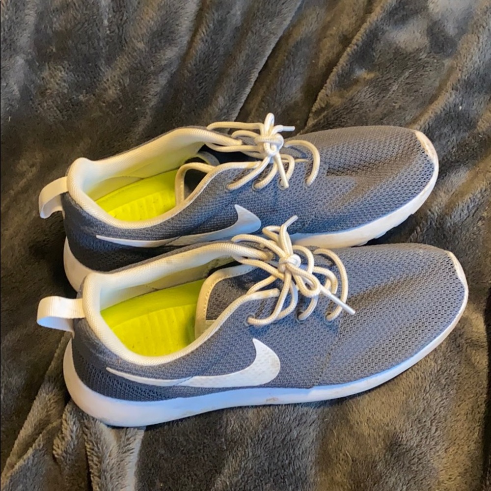 Nike gray and white running shoes